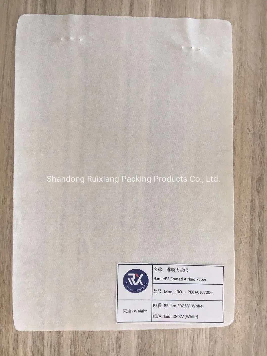 Papel Airlaid recubierto de película de PE impermeable blanco personalizado para almohadilla de maternidad fabricado en China